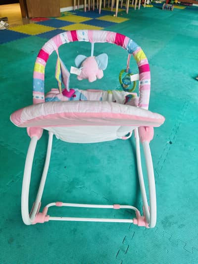 MULTIFUNCTIONAL ROCKING CHAIR