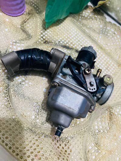 125 ka carburetor hai pz26 hai