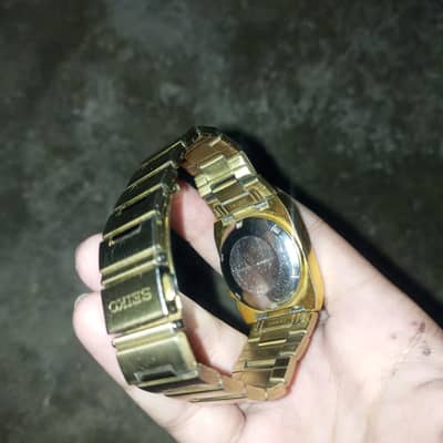 Seiko5 TV dial golden watch