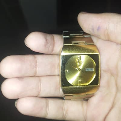 Seiko5 TV dial golden watch