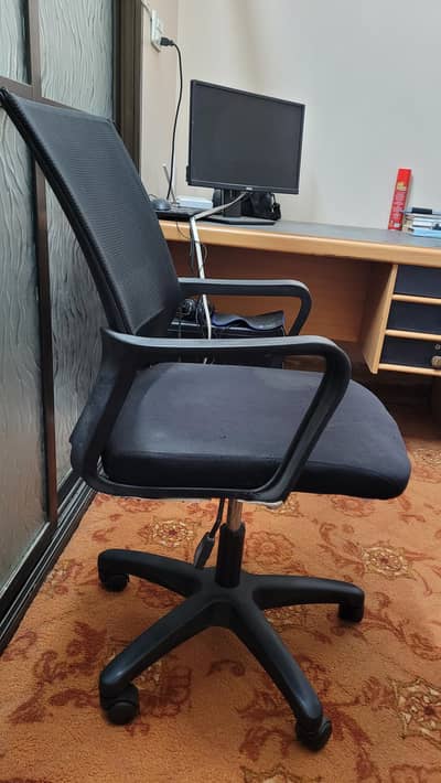 Black office table with chair