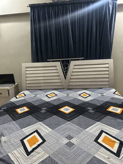 Double bed, with 4door cupboard,one side table, dressing table