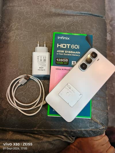 Infinix Hot 60i with box and charger . 6+6=12 GB ram and 128 GB mamery