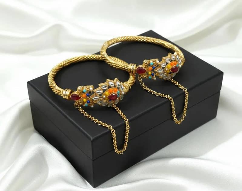 gold toned bangles 0