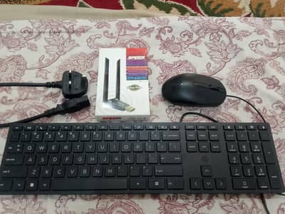 HP keyboard, HP mouse, RealTek WiFi Adaptor, Computer Power cable