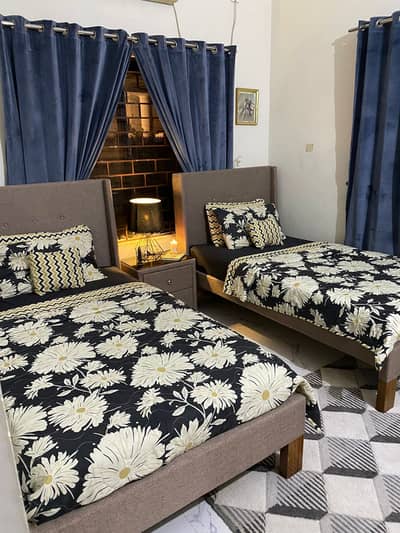 2 single bed with side table