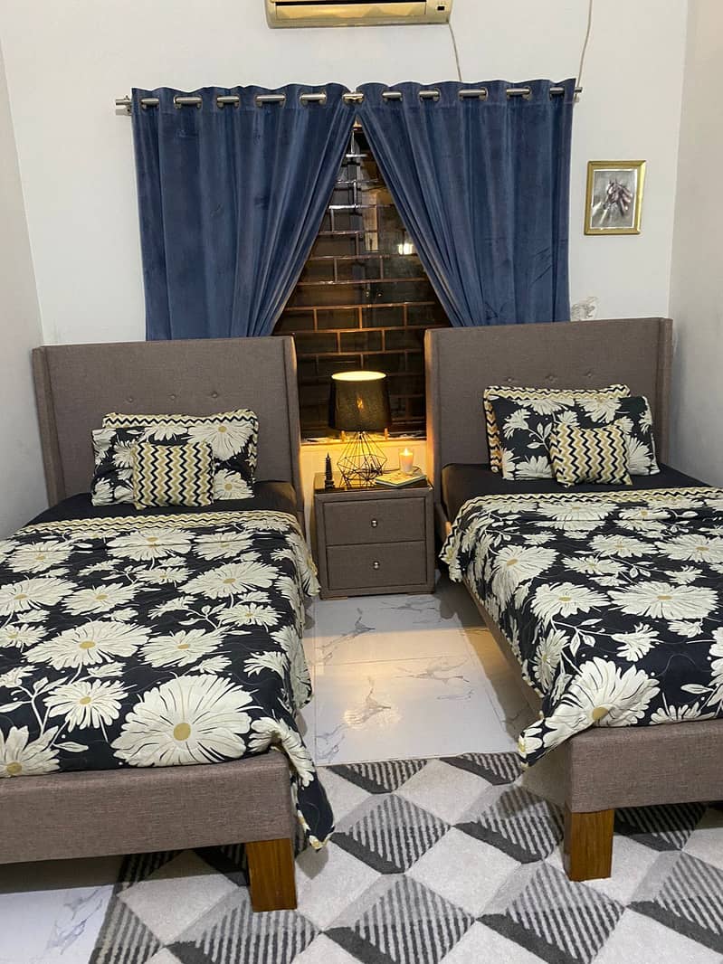 2 single bed with side table 4