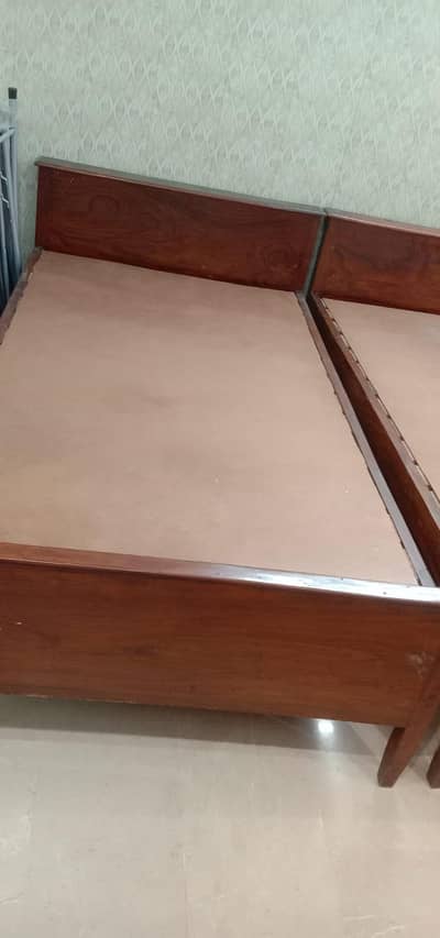 solid wood two single bed for sale 20k.