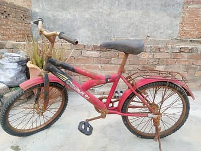 Kids Red bicycle for sale.