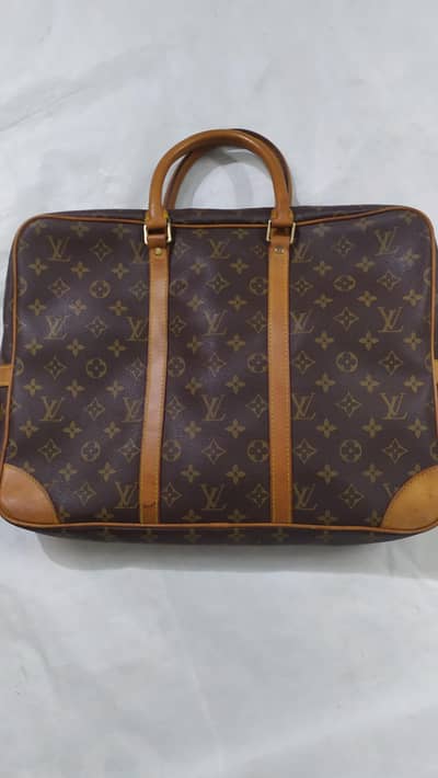 Louis Vuitton travel handbag Imported