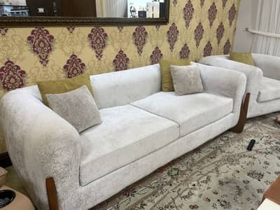 Modern contemporary curved-arm sofa set with wooden legs