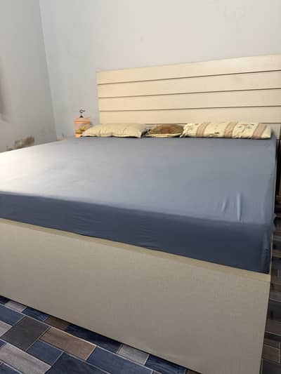 Bed with side tables and mattress
