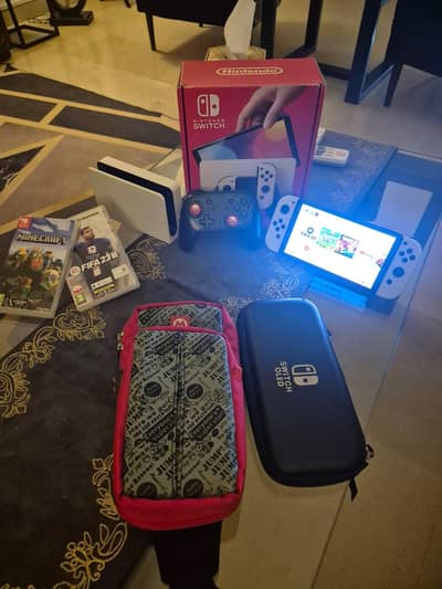 NINTENDO SWITCH OLED model with accessories
