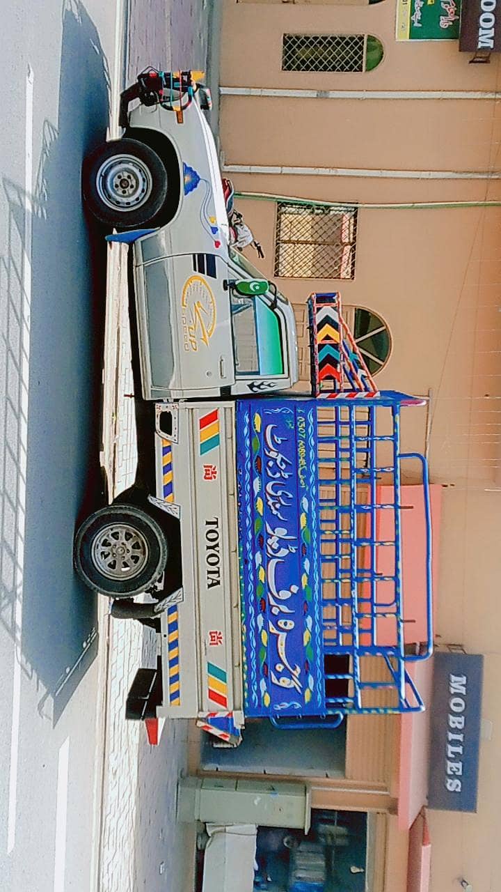 بہترین  کنڈیشنر   نیو باڈی ٹرالی  تازہ کام ہوا  بہترین ٹائر  سٹنڈر انج 0