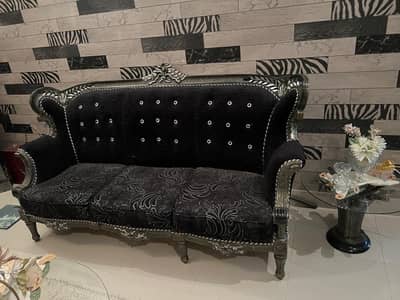 Sofa set with tables and chairs