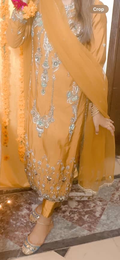 Musturd colour kapri with long shirt whit net dupata full heavy dress