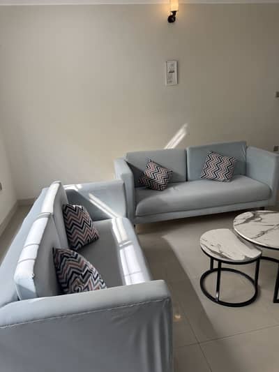 Ice blue 7 seater sofa with center table and mini table & curtains