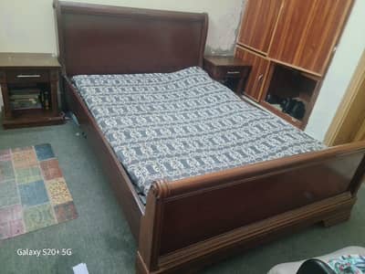 almost new bed made of proper and strong wood