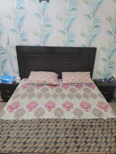 wooden bed available in very reasonable rate