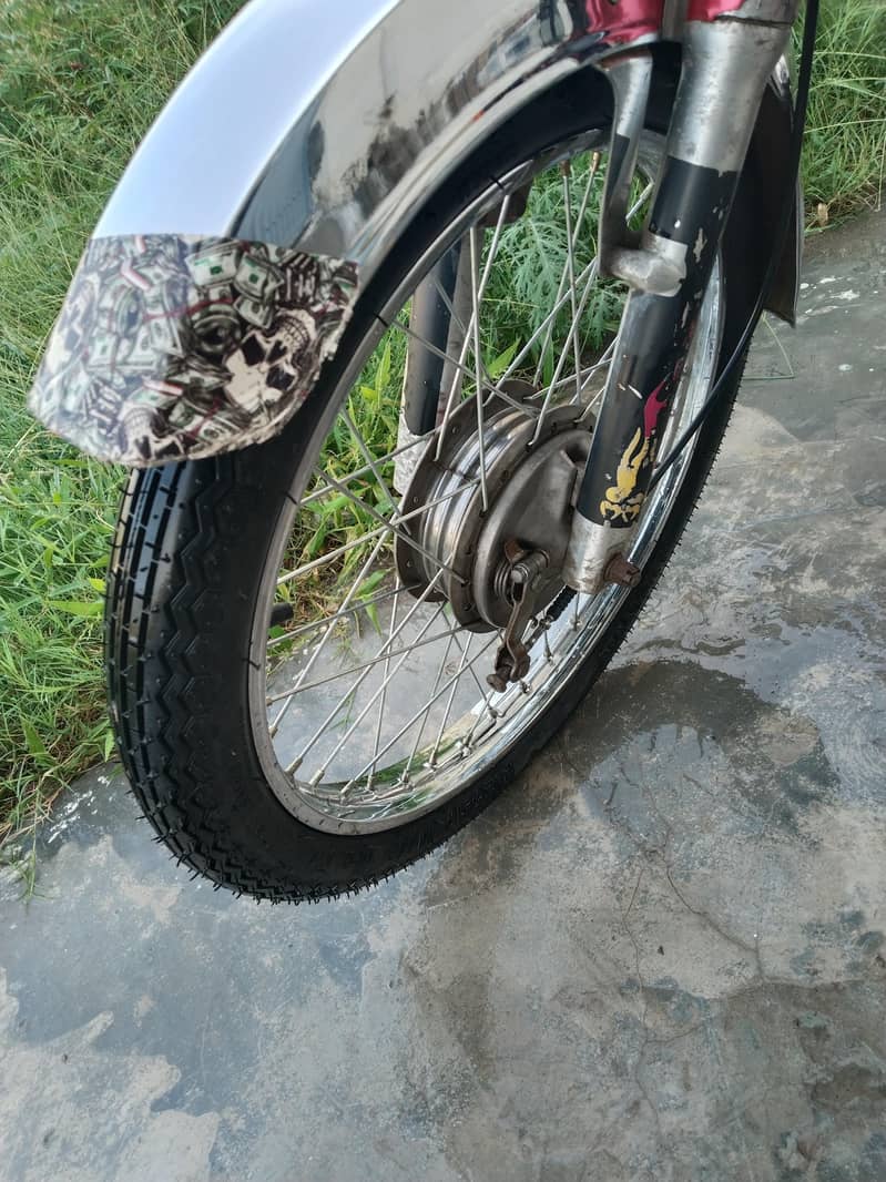 United 70cc 3