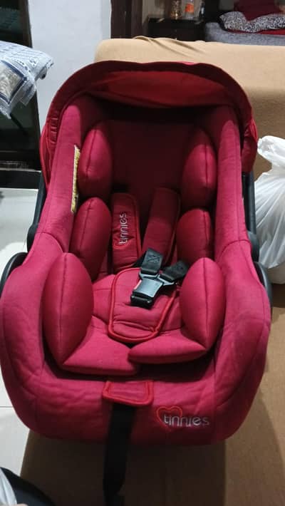 Tinnies car seat available for sale