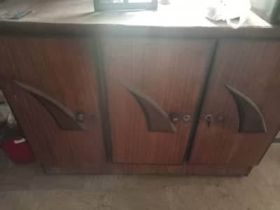 Wooden cupboard urgent sale.