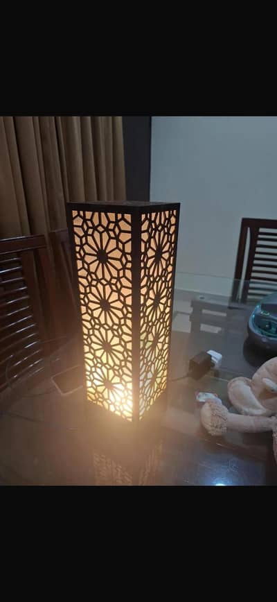 Wooden Floor Lamp with Geometric Cutouts Dark Brown Golden Glow