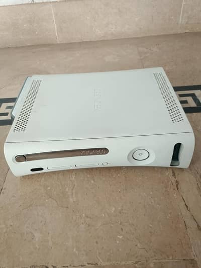 Xbox 360 with 320GB gard 100 installed games and 2 wired controllers.