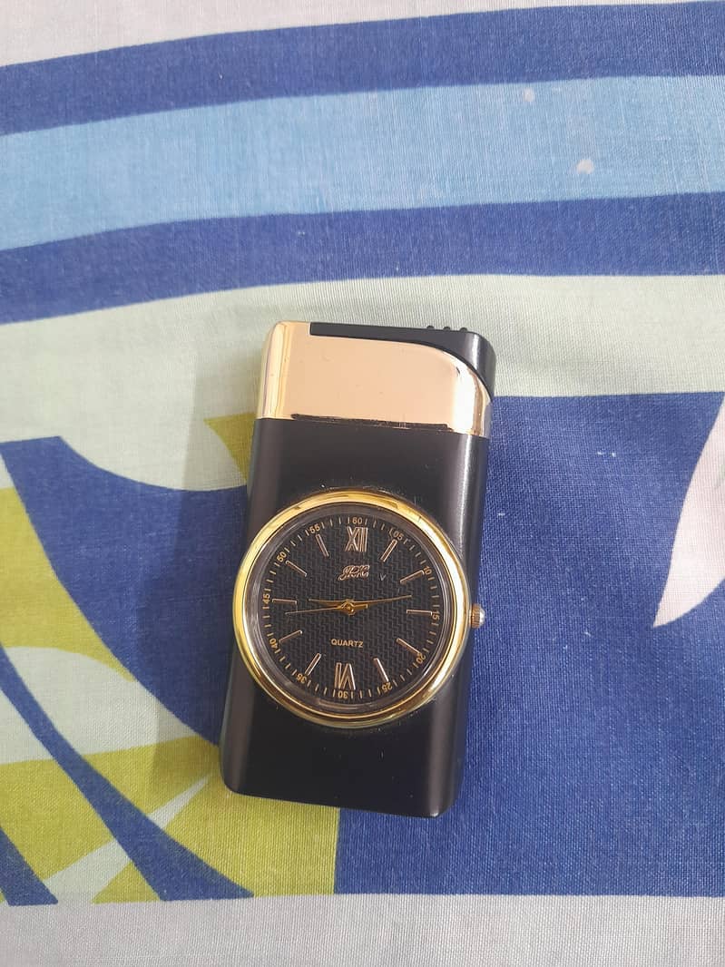 Fancy lighter with clock 10/10 condition 0