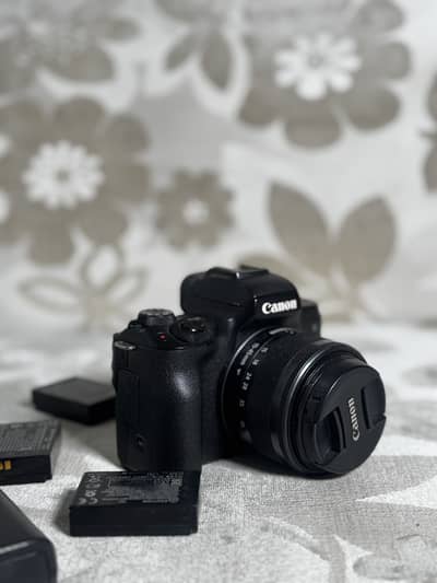 Canon M50 for sale with 3 batteries and original charger and box.