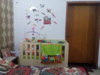 Wooden baby cot