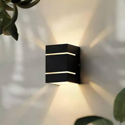 Modern wall lamp with golden light