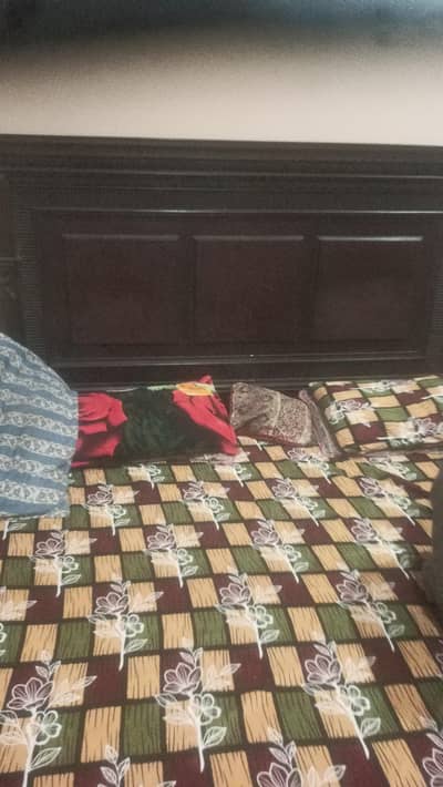 king bed with side table and dressing table