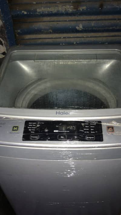 Auto matic washing  machine haier cumpani washer and drayer