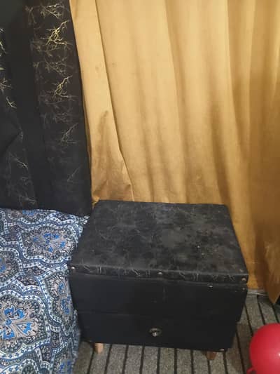 black bed set including a bed a side table and 5 curtains