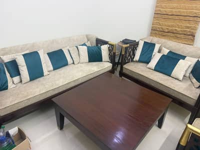 slightly Used sofa for sell 4 seater with centre table