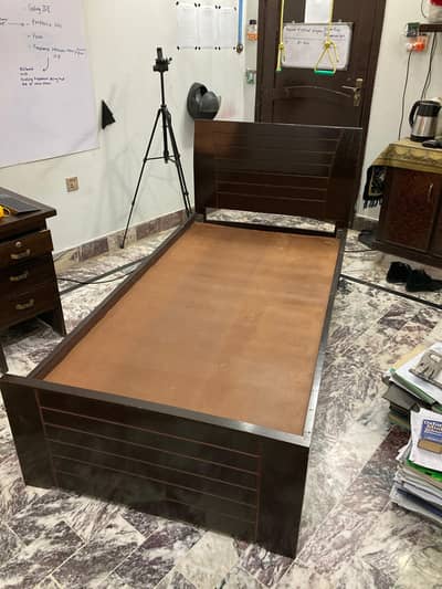 wooden single bed