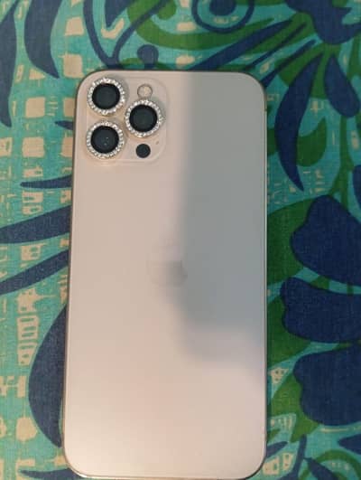 Apple iPhone 12 Pro Max with charger