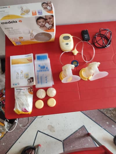 Medela Swing  Switzerland Double Electric Rechargeable Breast Pump