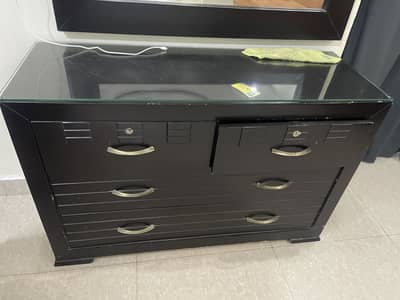 2 side tables one center table along with mirror and a bed