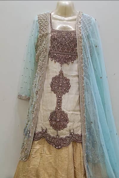 Elegant Mint Green & Champagne Gold Bridal Jacket Lehenga Set