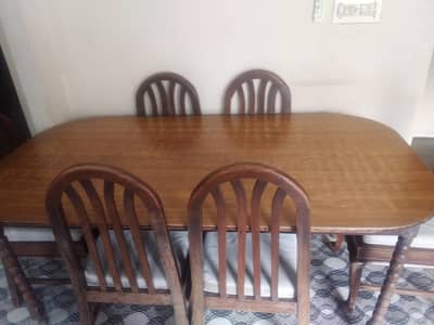 Wooden dining table with 6 chairs