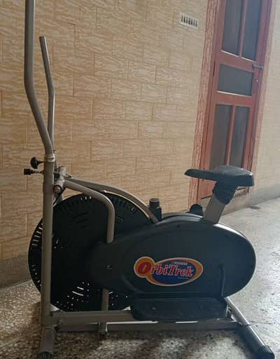 OrbiTrek dual-action elliptical trainer and stationary exercise bike