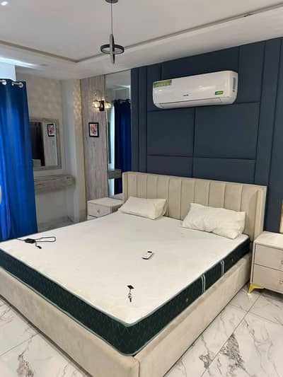 A fully furnished 2-bedroom apartment facing the Eiffel Tower in Bahria Town, Lahore is available for rent at PKR 90,000 per month