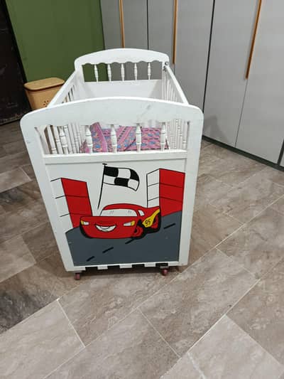 Almost New (unused) wooden baby cot for sale