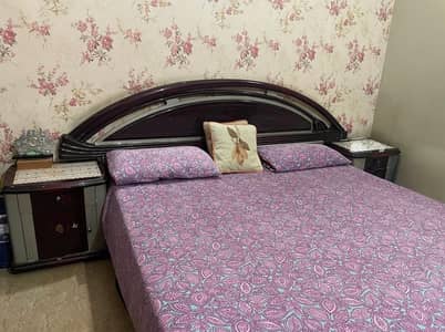 Bed, side corners and dressing table