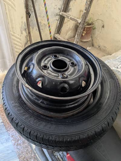 12" rim with 13" tyre
