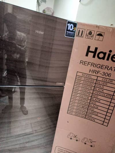 Haire fridge glass door bohat kum used hui ha