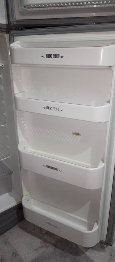 Dawlance fridge used medium size