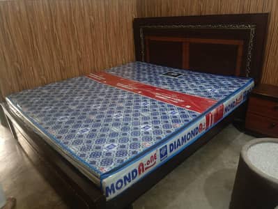 wooden bed and side tables- good condition